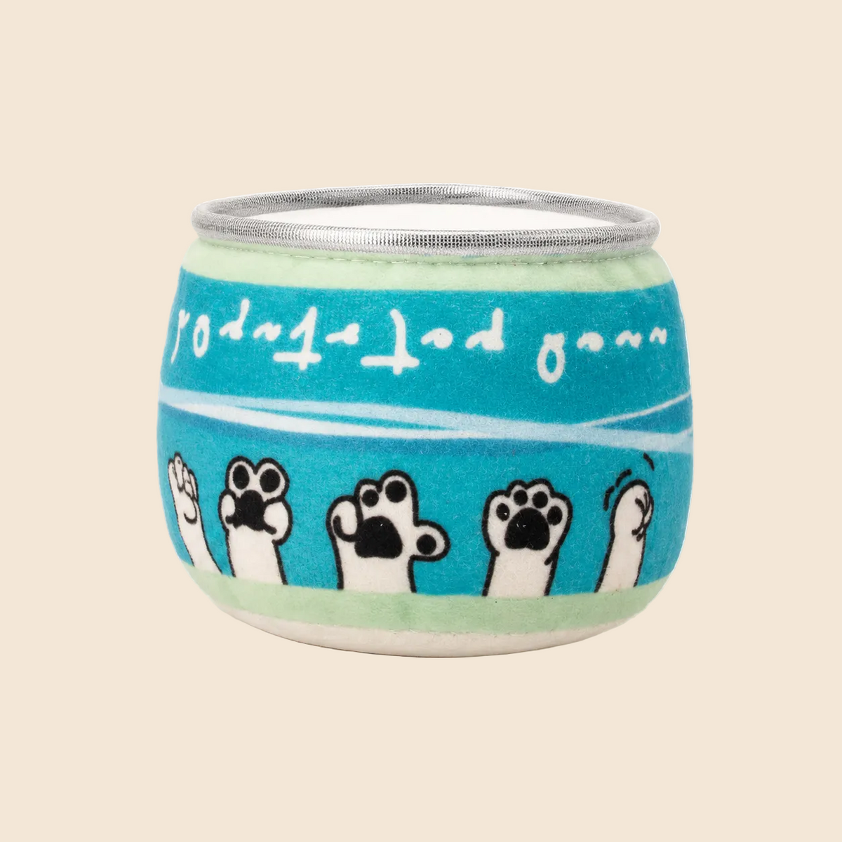 A small can-shaped cup with a silver rim, decorated with a turquoise blue band featuring white paw prints and white cursive text, on a light cream background.