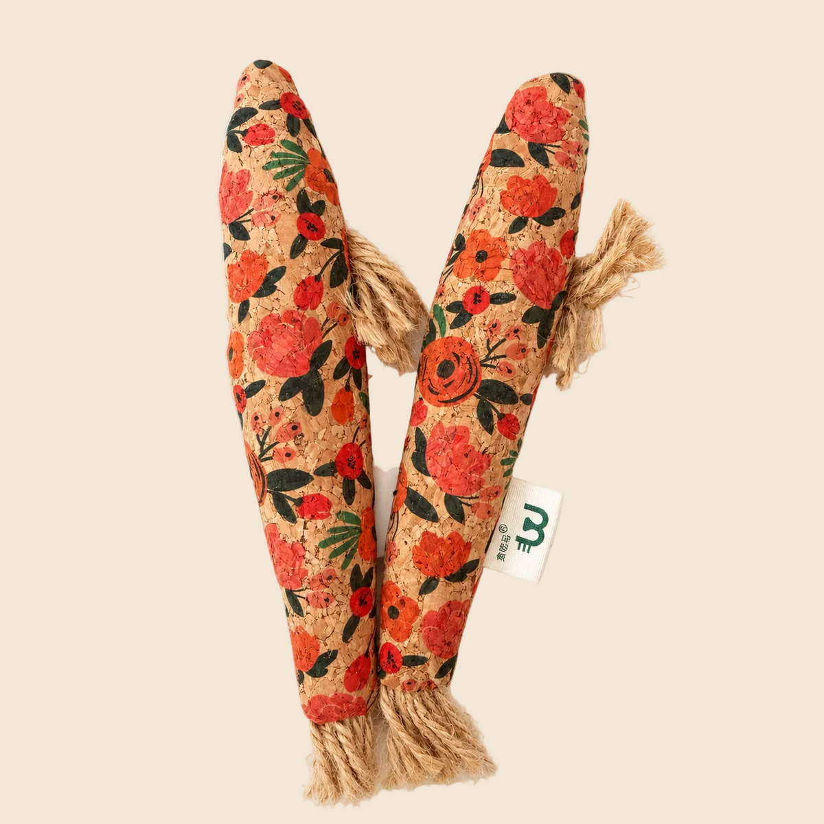 Natural Matatabi Silvervine fish-shaped cat toy with a soft plush body and textured rope tails, filled with silvervine powder and Polygonum wood chips.