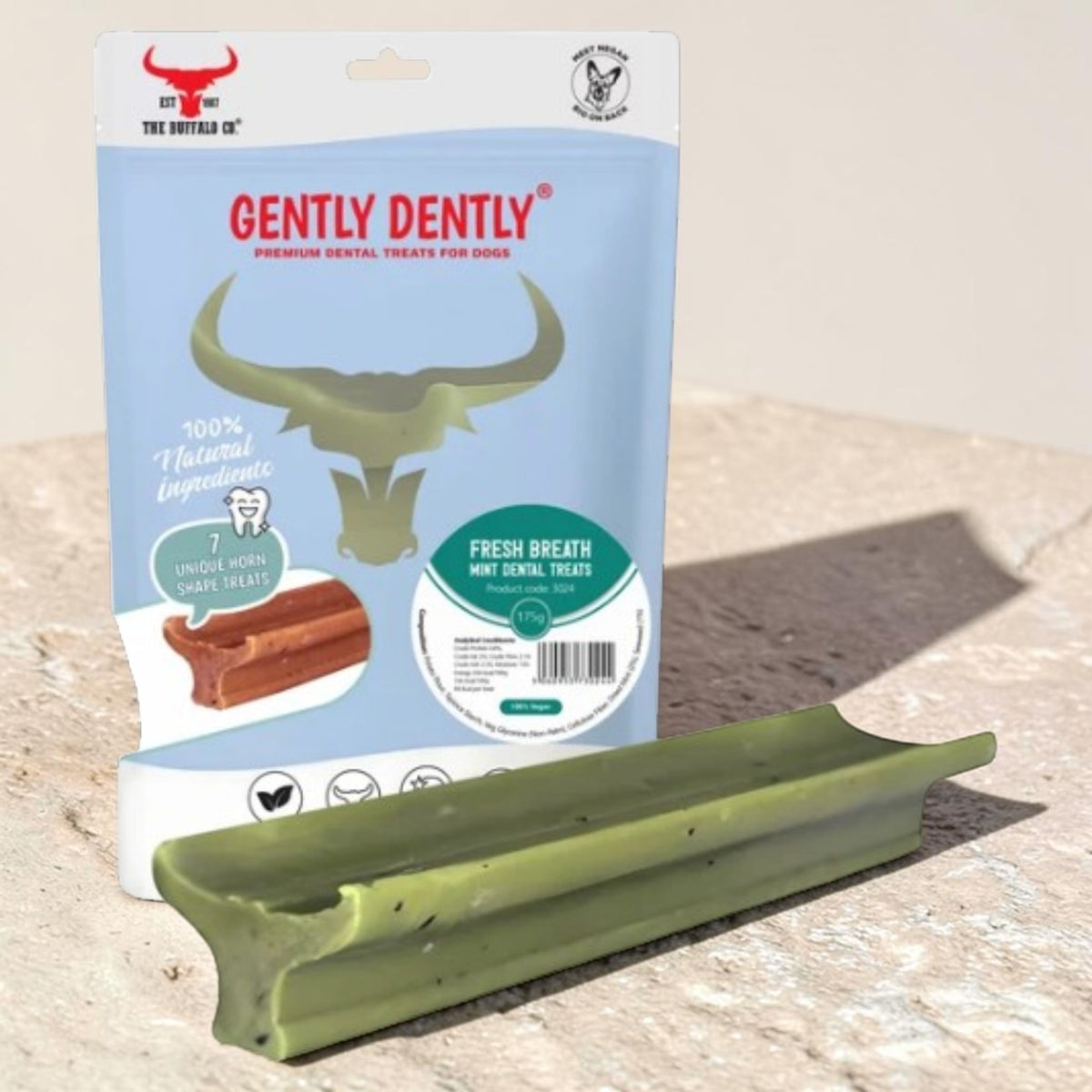 A mint flavored dental treat for dogs shown in its blue and white retail packaging.