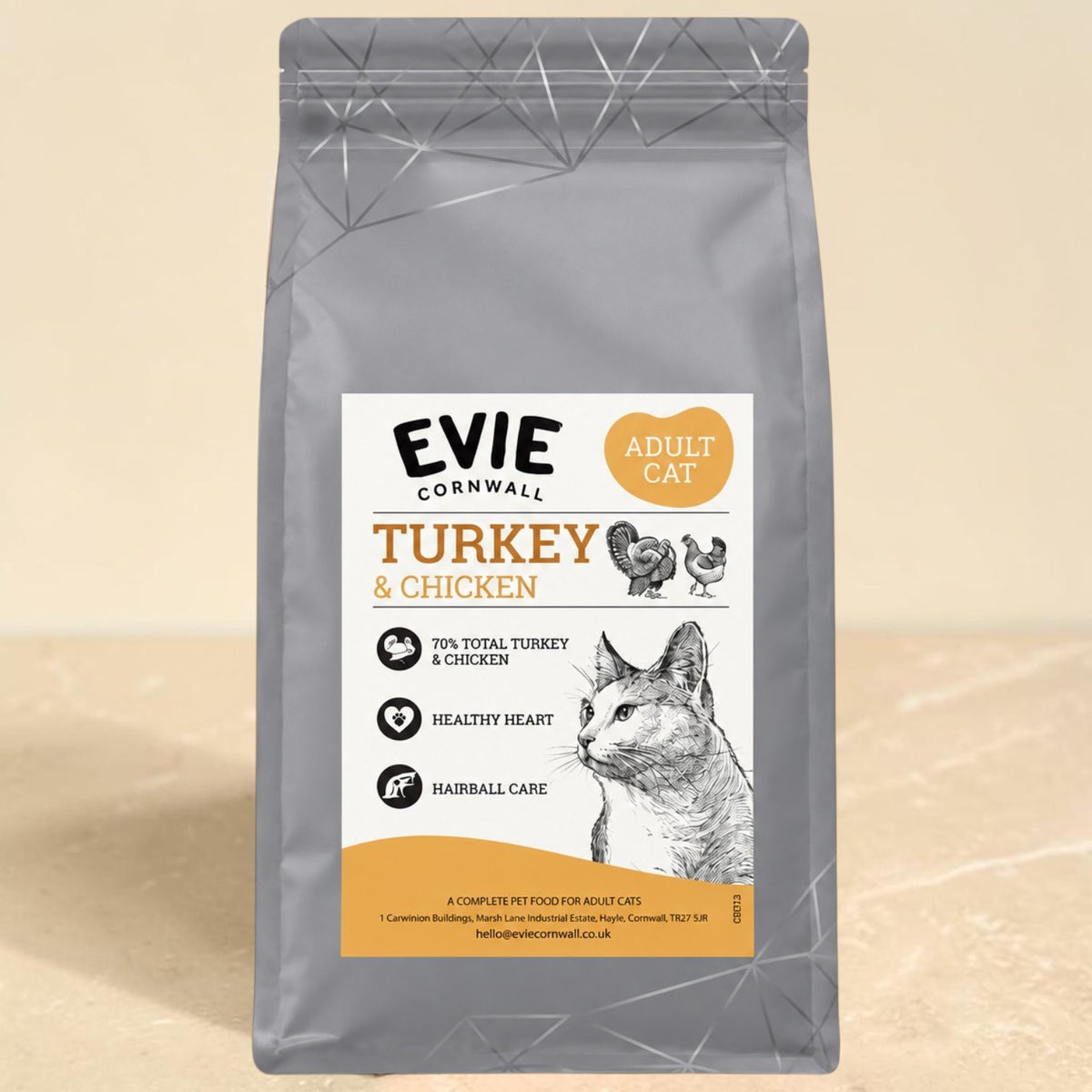 A bag of Evie Cornwall Adult Cat Turkey & Chicken food, shown standing upright against a neutral beige background.
